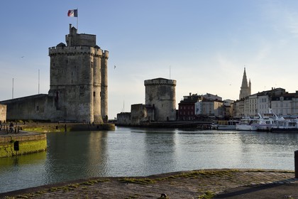 France, Charente-Maritime, La Rochelle, the Old Port, Tour Saint Nicolas and Tour de la Chaine protect the entrance to the Old Port, the tour de la Lanterne in the background
