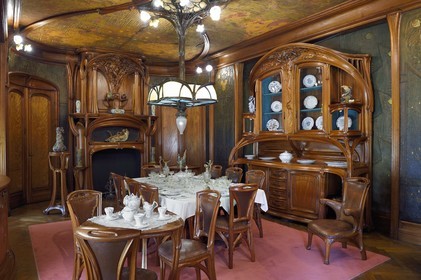 France, Meurthe-et-Moselle, Nancy, Ecole de Nancy Museum, the Art Nouveau dining room of Masson (1903-1906), furniture and woodwork by Eugène Vallin, leather panels and ceiling by Victor Prouvé