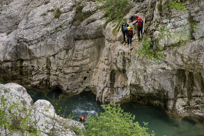 France, Alpes de Haute Provence, Parc Naturel Régional du Verdon, Rougon, Grand Canyon of Verdon, Canyoning in the Verdon River and the cliffs of the Samson corridor, seen from the trail sentier Blanc-Martel on the GR4