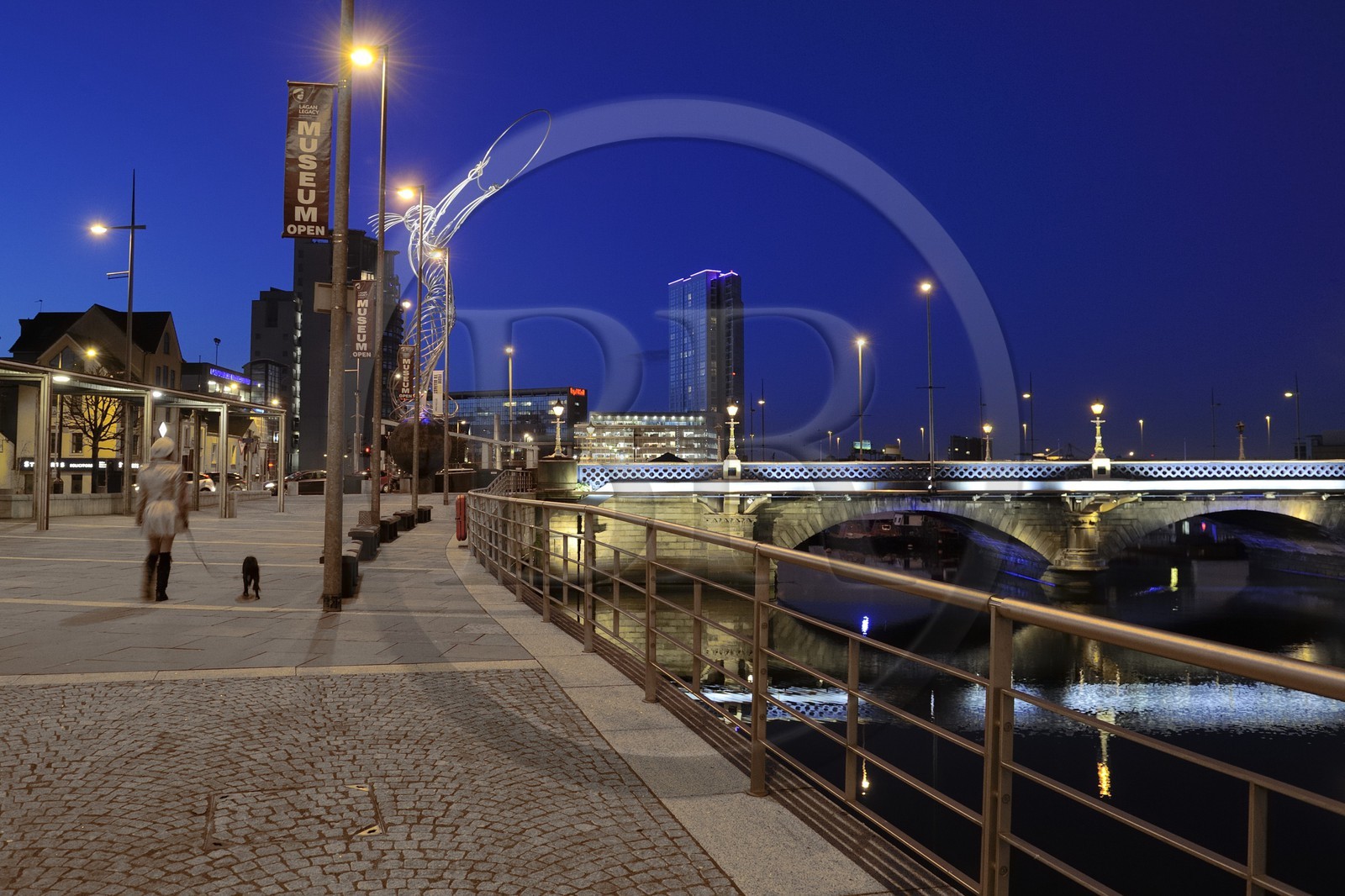 United Kingdom, Northern Ireland, Belfast, the waterfront on the Lagan riverside, Queens Bridge, Beacon of Hope is art metal sculpture by Andy Scott 19.5 metres high constructed in 2007 in Thanksgiving Square and the tallest skyscraper in Ireland Obel Tower