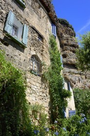 France, Var, Provence Verte, Cotignac, troglodyte habitat in the tufa cliff of 80 meters high and 400 meters wide