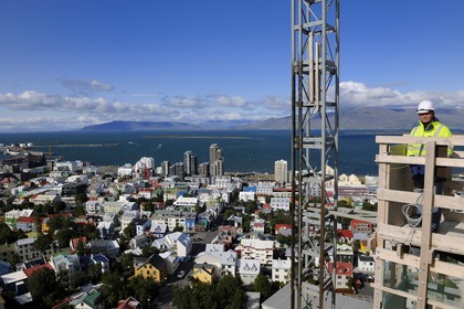 Iceland, Reykjavik, the old town and the harbor from the top of the church under construction Hallgrimskirkja Church