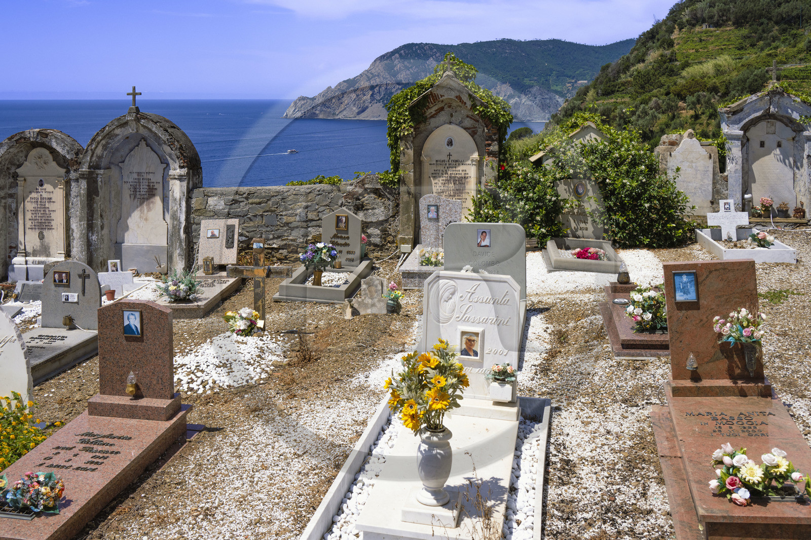 Italy, Liguria, Cinque Terre National Park listed as World Heritage by UNESCO, marine cemetery from the village of Vernazza below