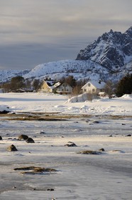 Norway, Nordland County, Lofoten Islands, landscape of a frozen bay in Winter on Vagan Island