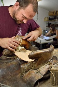 France, Gard, Fourques, Victor Mailhan saddlery and harness manufacturing in his workshop, saddle of camarguais gardian