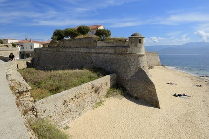 France, Corse du Sud, Ajaccio, watch turret and walls of the Citadel on the old town beach