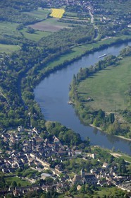 France, Val d'Oise, the village of Vetheuil is nestled in a loop of the Seine river and Notre Dame church painted by Claude Monet (aerial view)