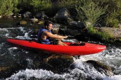 France, Herault, Orb valley, kayaking the river Orb at the moulin de Travassac next to Mons la Trivalle, Sylvain Cathala from Ateliers Rivière Randonnees