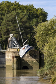 France, Loire Atlantique, Le Pellerin, open-air contemporary art collection Estuary, the 9 m long sailboat sculpture Misconceivable created by the Austrian artist Erwin Wurm at the access lock to the Martinière canal on the Loire