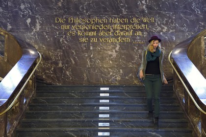 Germany, Berlin, Humboldt-Universität (Humboldt University) on Unter den Linden, sentence of Karl Marx who studied here and installation entitled Vorsicht Stufe (Watch your step) by the artist Ceal Floyer 2009