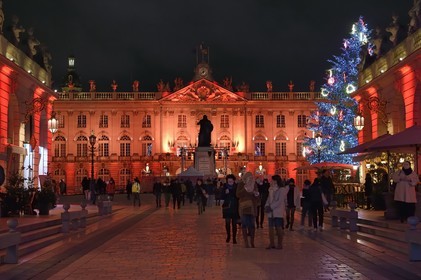 France, Meurthe-et-Moselle, Nancy, place Stanislas (former Place Royale) during the feast of Saint-Nicolas, listed as World Heritage by UNESCO, the large decorated Christmas tree and the Town Hall in the background