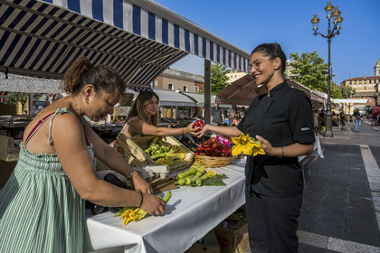 France, Alpes-Maritimes, Nice, listed as World Heritage by UNESCO, Old Nice, the Cours Saleya market, Virginie Acchiardo, chef of the restaurant Chez Acchiardo in rue Droite, goes shopping at her childhood friend, the market gardener Nathalie Travia (Chilini) and her daughter Angelique