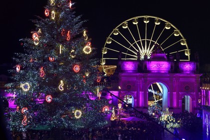 France, Meurthe-et-Moselle, Nancy, place Stanislas, the parade of Saint-Nicolas, parade float of the Medical-Educational Institute and Motor Education Center of Flavigny with Funny Bees in front of the Arc de Triomphe (Porte Héré)