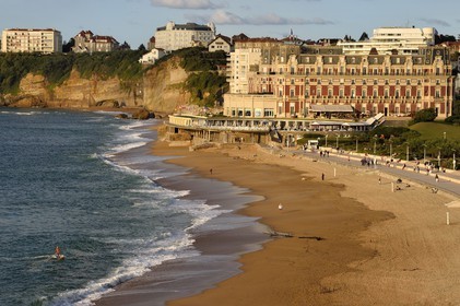France, Pyrenees Atlantiques, Basque Country, Biarritz, the Grande Plage (town's largest beach) and the Hotel du Palais, stand up paddle