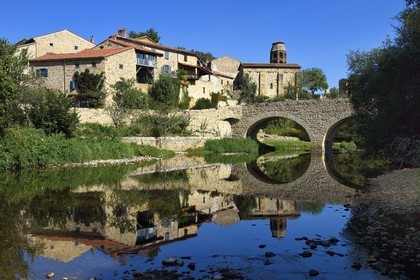 France, Haute Loire, Lavaudieu, labelled Les Plus Beaux Villages de France (The Most Beautiful Villages of France), old bridge over Senouire river and the former Saint Andre (St Andrew) abbey church