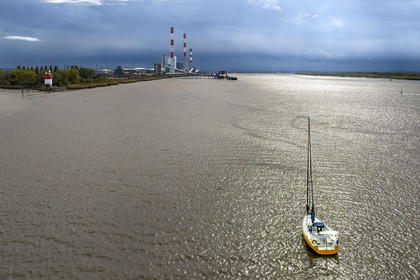 France, Loire Atlantique, Cordemais, open-air contemporary art collection Estuaire, the Villa Cheminée created by the Japanese artist Tatzu Nishi on the banks of the Loire river, sailboat going up the Loire from the estuary and the Cordemais thermal power plant in the background (aerial view)