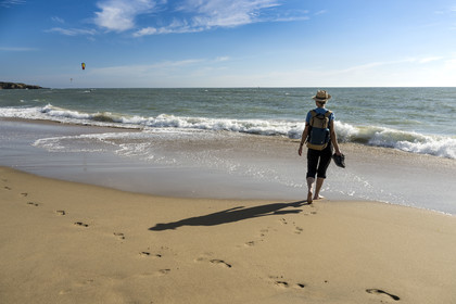 France, Vendée (85), Talmont Saint Hilaire, la Pointe du Payré, hiker on Veillon beach