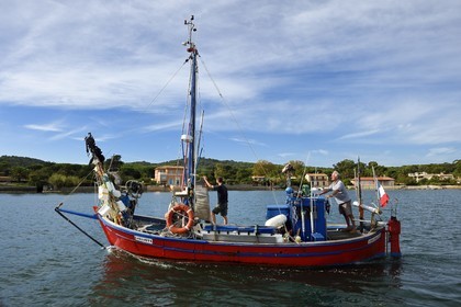 France, Var, Iles d'Hyeres, Parc National de Port Cros (National park of Port Cros), Porquerolles island, Bernard Samuel called Sam the fisherman on his boat Le Corailleur