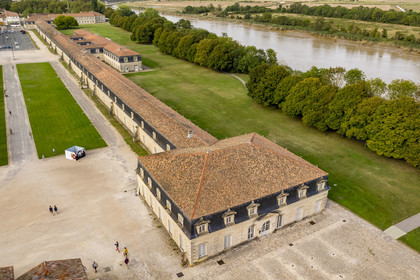 France, Charente Maritime, Rochefort, International Sea Center in the former maritime Arsenal of Rochefort, the Corderie Royale designed by Colbert in 1666 on the banks of the Charente river (aerial view)