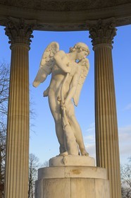France, Yvelines, Chateau de Versailles, listed as World Heritage by UNESCO, Domaine de Marie Antoinette, the Petit Trianon Garden, the Love Temple, statue by Bouchardon called Cupid Cutting His Bow from the Club of Hercules