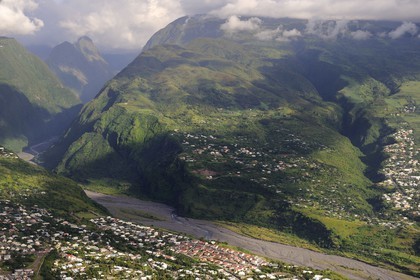 France, Reunion Island (French overseas department), Le Port, la Rivière des Galets coming down from the Cirque de Mafate (aerial view)