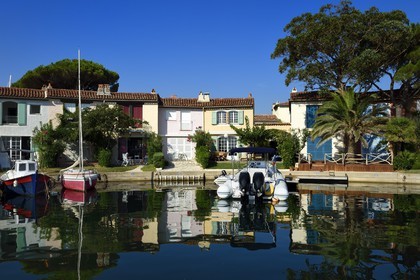 France, Var, Gulf of St Tropez, the Port Grimaud seaside town, houses with private jetty
