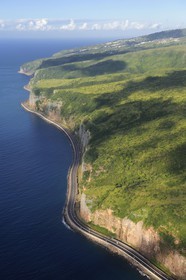 France, Reunion Island (French overseas department), the Route du Littoral (Coastal Road) at the foot of the cliffs between Le Port and Saint Denis (aerial view)