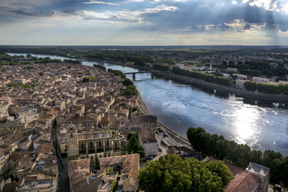 France, Bouches du Rhone, Arles, the old town with the Saint-Julien church on the left bank and the Trinquetaille district on the right bank of the Rhone (aerial view)