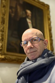 France, Haut Rhin, Colmar, Museum and birth house of Bartholdi, the curator Regis Hueber and the portrait of Bartholdi in the background