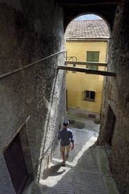 France, Alpes-Maritimes, Contes, the Impasse Saint-Martin is a pontis, stepped covered walkway under the houses