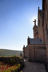 France, Bas Rhin, Mont Saint Odile, Mont Sainte-Odile Abbey also known as Hohenburg Abbey, statue of Saint Odile placed on the roof of the convent and facing the plain of Alsace