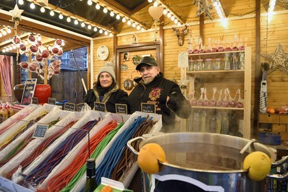 France, Bas Rhin, Strasbourg, old town listed as World Heritage by UNESCO, Christmas market (Christkindelsmarik) in Place Broglie, the Sassi family which has run a mulled wine stand since 1947