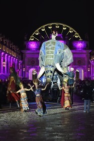 France, Meurthe-et-Moselle, Nancy, place Stanislas, the parade of Saint-Nicolas, Elephantasia and its dancers from the company Planète Vapeur in front of the Arc de Triomphe (Porte Héré)