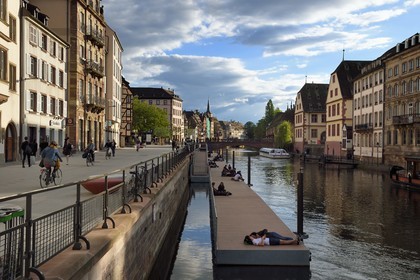 France, Bas Rhin, Strasbourg, old town listed as World Heritage by UNESCO, banks of Ill River quai des Bateliers turned into a meeting place for pedestrians, a floating pontoon is put in place to get closer to the river
