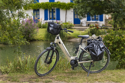 France, Deux-Sèvres, le Marais Poitevin, Green Venice, Peugeot electric bicycle designed for touring
