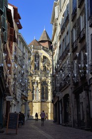 France, Pyrenees Atlantiques, Basque Country, Bayonne, the rue du Pilori and St. Catherine's Cathedral in the background