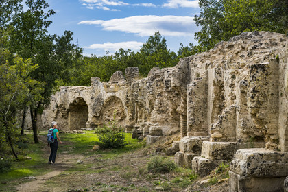 France, Gard, Vers Pont du Gard, hiker along the remains of the Roman aqueduct over 52 km long which brought water from the Fontaine d'Eure at the foot of Uzès to Nimes via the Pont du Gard
