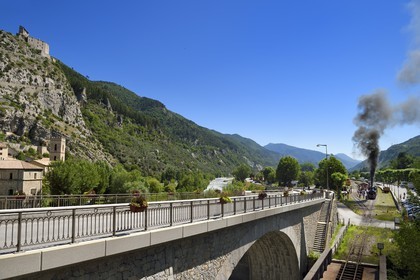 France, Alpes de Haute Provence, Entrevaux Medieval city fortified by Vauban, Train des Pignes historic train under the citadel