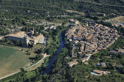 France, Aude, Lagrasse village, labelled Les Plus Beaux Villages de France (The Most Beautiful Villages of France), Sainte Marie de Lagrasse Abbey (aerial view)