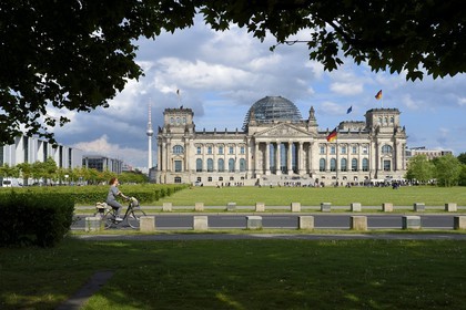 Germany, Berlin, the Reichstag with the Bundestag(German Parlement since 1999) glass dome by the architect Sir Norman Foster and the TV tower in the background