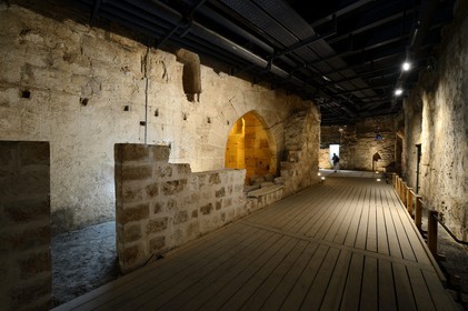 Israel, North district, Galilee, Acre (Akko), old town, listed as World Heritage by UNESCO, the Crusaders underground city just beside the Hospitaller fortress, the southern street  with the remnants of shops at the entrance of a chapel