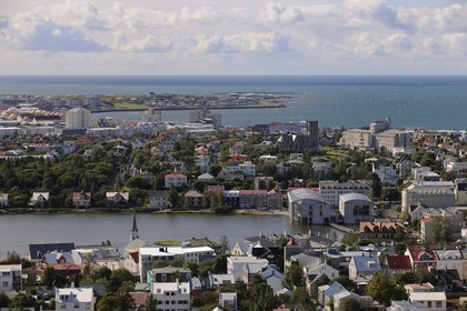 Iceland, Reykjavik, the City Hall (right) on Lake Tjörnin