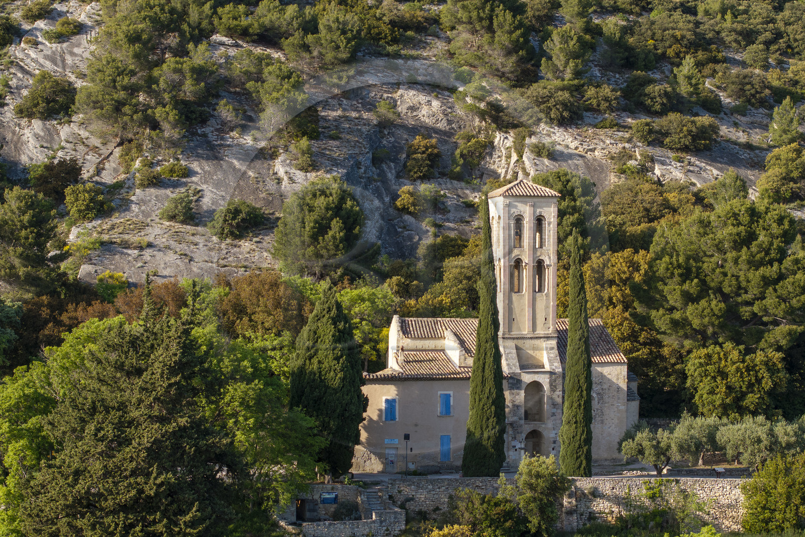 France, Vaucluse, Dentelles de Montmirail mountains, Beaumes de Venise, The Notre-Dame d'Aubune chapel from the 11th and 13th centuries at the foot of the Courens plateau is one of the finest examples of Provencal Romanesque art (aerial view)
