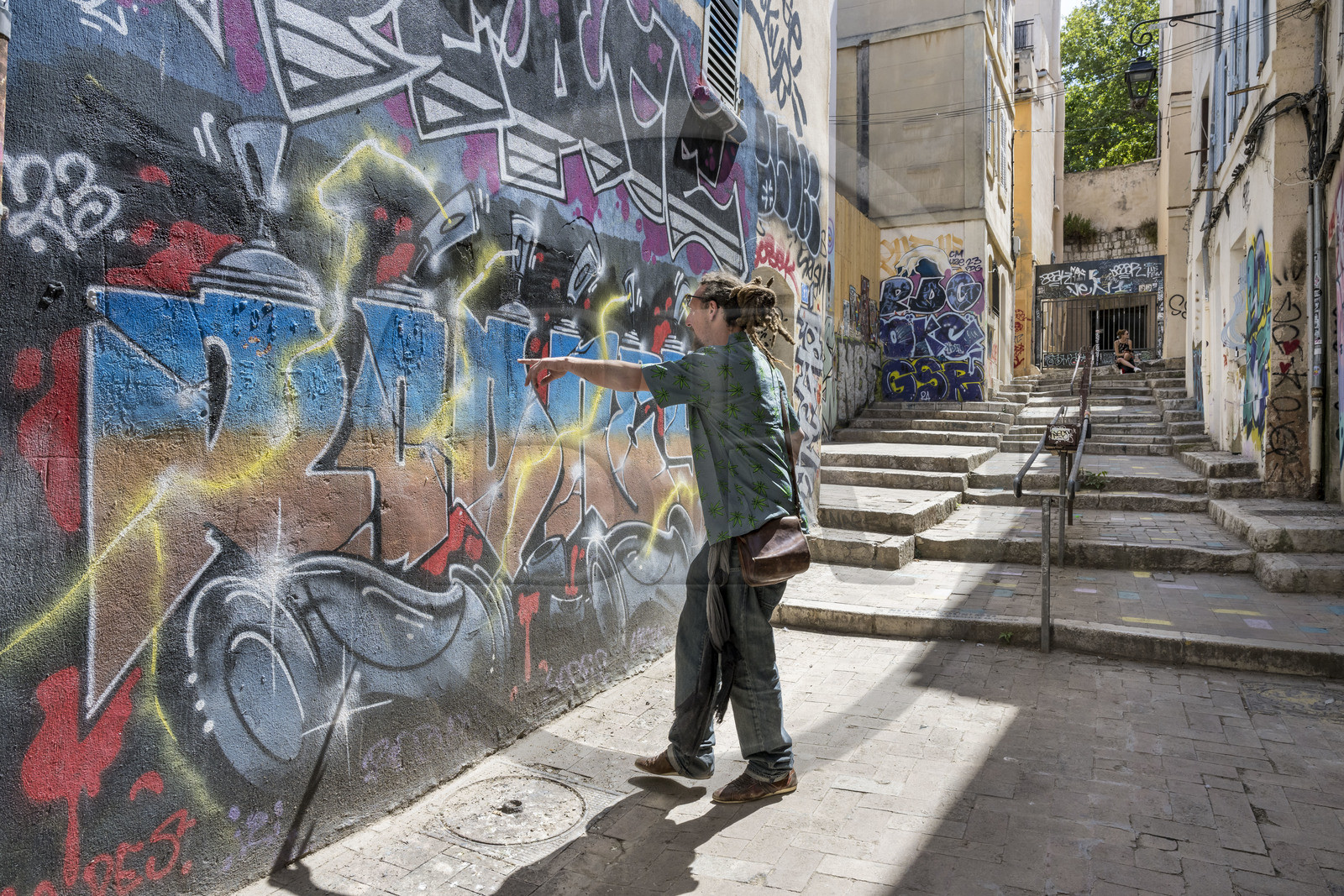 France, Bouches du Rhone, Marseille, Panier district, graffiti by street artist Rodney in an alleyway perpendicular to Rue du Refuge