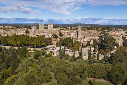 France, Gard, Uzès, the King's tower, the Eveché tower, the Ducal castle called Le Duché with the Bermonde tower and the Saint-Théodorit cathedral with the Fenestrelle tower on the right (aerial view)