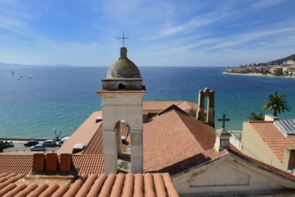 France, Corse du Sud, Ajaccio, St. Erasmus church devoted to the saint patron of the fishermen overlooking the bay of Ajaccio in the background