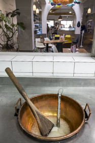 France, Vaucluse, Saint Didier, In the Nougats Silvain workshop,  nougat makers peasant, Charles-Henri Bagnol makes a slab of black nougat, preparation of the caramelized honey base