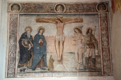 France, Haute Corse, Calvi, the citadel, oratory of Saint-Antoine, fresco depicting the Crucifixion (the donor at the foot of the Christ, the Virgin and St. Anthony Abbot with his small pig, St. Sebastian and St. Roch)