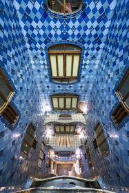 Spain, Catalonia, Barcelona, Eixample district, Passeig de Gracia, Casa Batllo by Catalan modernist architect Antoni Gaudi, UNESCO World Heritage site, courtyard, color gradient in the skylight