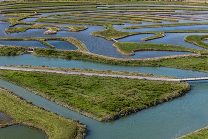 France, Vendée (85), Talmont Saint Hilaire, Guittière marshes in the hinterland of Pointe du Payré, Passage du Cul d’Ane, marshes developed for fish farming of sea bream, mullet and eels (aerial view)